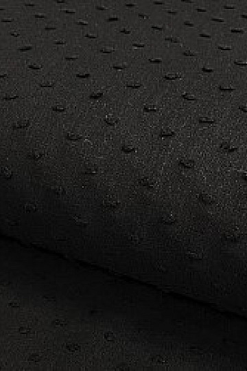 Tessuto di cotone nero con borchie