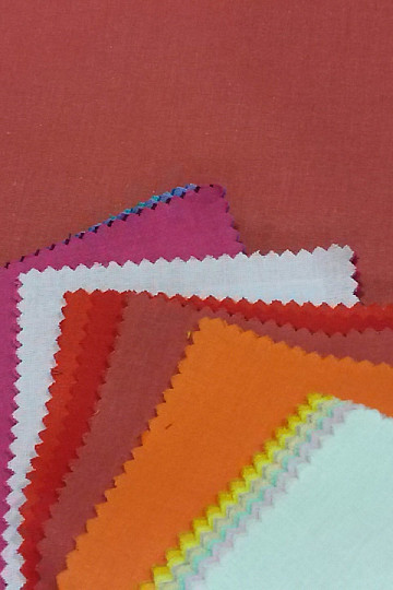 Tessuto cotone UNI rosso polvere