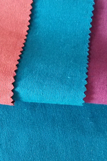 Tessuto in cotone UNI PAON verde scuro