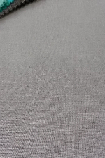 Tessuto di cotone grigio chiaro UNI GRIS