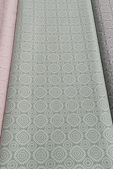 Tessuto geo di cotone verde sole