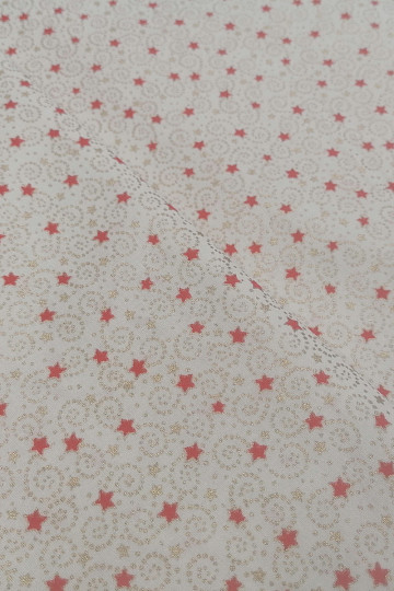 Tessuto natalizio in cotone color crema con mini stelle