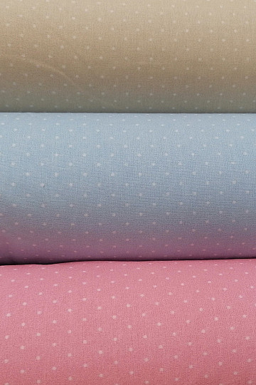 Tessuto di cotone rosa a pois