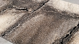 Tappeto in pezzi con design in marmo