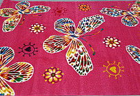 Farfalle colorate sul tappeto