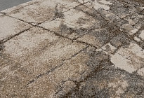 Tappeto in pezzi con design in marmo