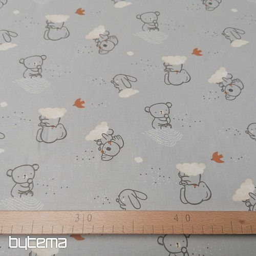 Tessuto di cotone grigio cielo animalier
