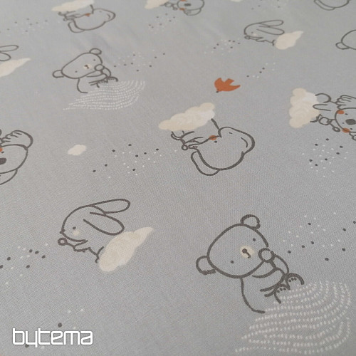 Tessuto di cotone grigio cielo animalier