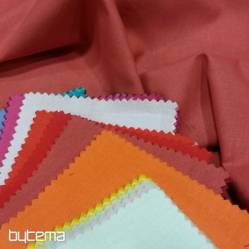 Tessuto cotone UNI rosso polvere